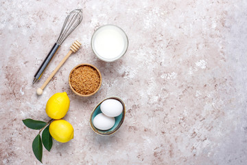Obraz na płótnie Canvas Cupcake baking background with kitchen utensils.