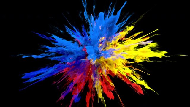 Color Burst - yellow red blue colorful smoke powder explosion or fluid ink particles in slow motion. Alpha matte isolated on black 60 fps