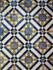 National Museum Azulejo cloister corridor with walls decorated with white and blue tiles.