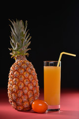 glass of juice with pineapple