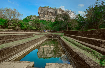 Naklejka premium Sigiriya Rock Fortress In Sigiriya, Sri Lanka. Sigiriya Has Been Listed As A World Heritage Site In Sri Lanka (With Computer Color Effects) 