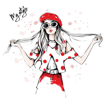 Hand drawn beautiful young woman in sunglasses and red beret. Fashion woman in spotted shirt. Stylish girl holding her long hair. Fashion woman look. Sketch. Vector illustration.