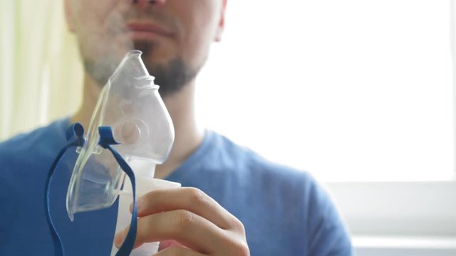 Turning on of the nebulizer. Inhaler for the treatment of lungs and bronchi.