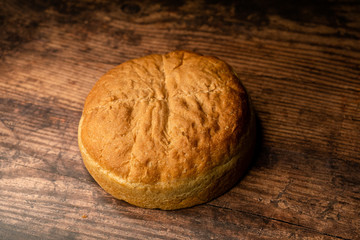fresh baked bread oaf on a wood board