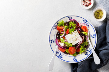 Greek salad of fresh vegetables, olives and feta. Traditional Mediterranean food.