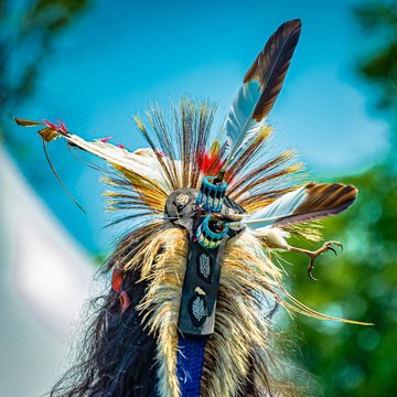 Closeup shot of the colorful feathers of a traditional Native Indian-American festive regalia