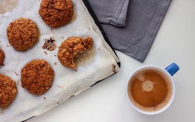 oat cookies and cup of coffee on the table
