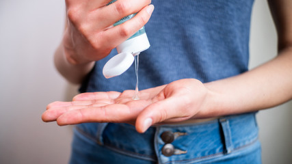Cleaning hands with sanitizer