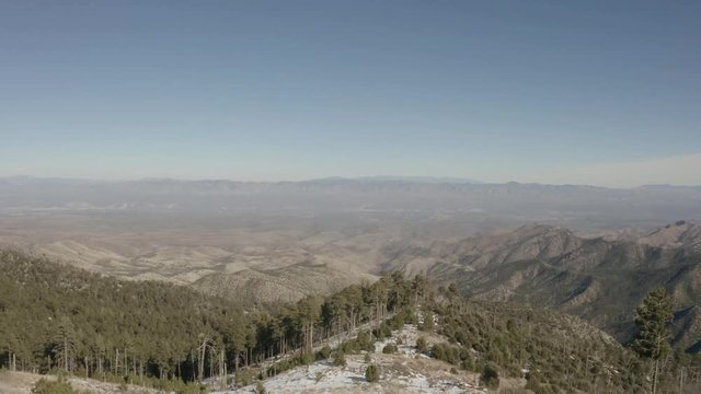 Flying over the high elevation alpine regions of Mt. Lemmon in Tucson, Arizona with snow on the ground.