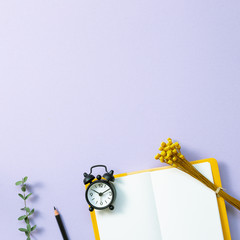 Work and study place, office supplies with floral decoration. flat lay, top view, copy space