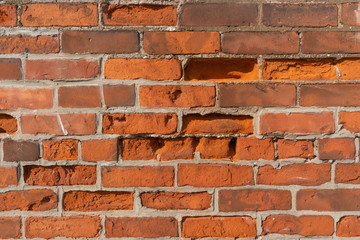 old red brick wall background with rectangular red bricks