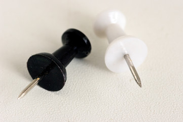 thumbtacks on white background