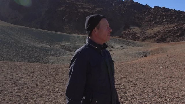 Man Looking Around Dry Arid Landscape