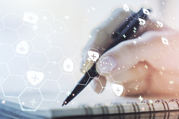 Creative abstract medical sketch and woman hand writing in notepad on background, Medicine and healthcare concept. Multiexposure