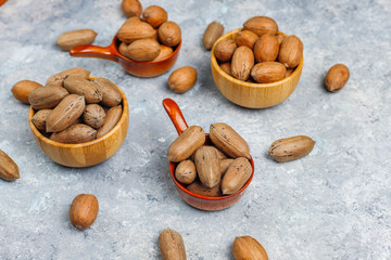Pecan nuts on light background,top view
