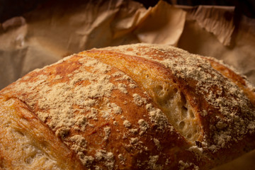 Delicious italian bread on wooden table. Rustic concept.