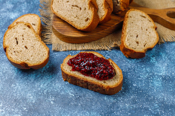 Bread slices with raspberry jam,easy healthy snack,top view