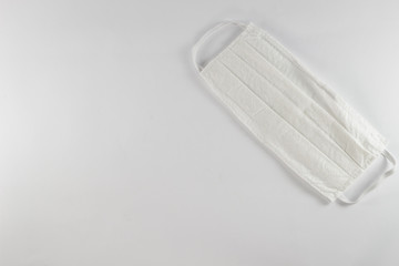 White medical disposable surgical protection mask to protect from Covid-19 Corona virus. Disposable...