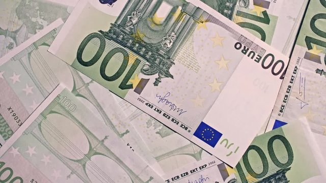 100 Euro notes close up macro shot, spinning in frame, 4k studio footage