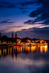 Fototapeta na wymiar Night view of Moselle in Koblenz of Germany; peaceful lake and buildings