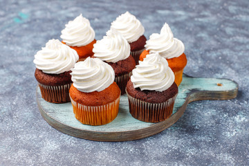 Cupcake baking background with kitchen utensils.