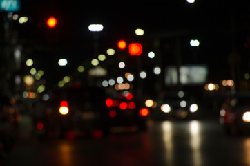 Fototapeta na wymiar Beautiful blurry lights of vehicles on the road in city