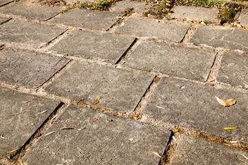 Obraz premium old large tiles on the road