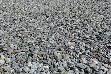 round stones and pebbles on river bank
