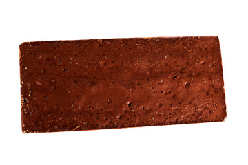 Tasty sweet popous milk black chocolate on the white background