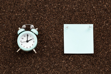 Memo board with empty stickers and clock for studying or working. Note papers for your message...
