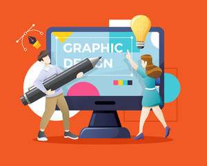 Designers or illustrators working together on giant computer display