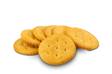 Pile of crunchy round crackers on white background with clipping path
