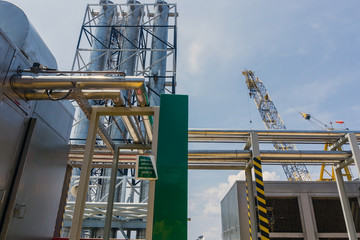 Stacks of exhaust funnel with processing facilities on a oil production platform