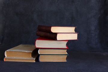 old books on blackboard