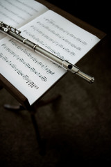 Fototapeta premium flute on music stand with sheet music