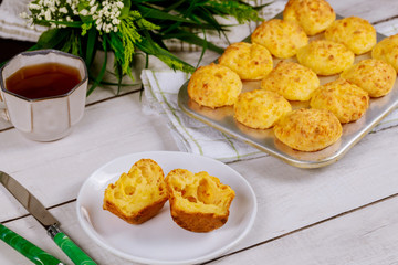 Cheese bread with tea. Brazilian traditional cuisine.