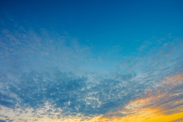 blue sky with clouds and sun