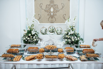 A sweet table with biscuits and candy for a party