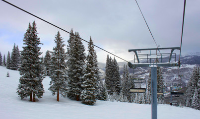 Chairlift at ski resort in Vail Colorado on a cloudy day