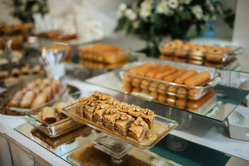 A sweet table with biscuits and candy for a party