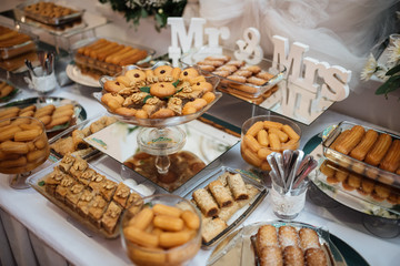 A sweet table with biscuits and candy for a party