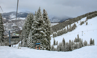 Run at ski resort in Vail Colorado with mountains behind