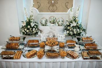 A sweet table with biscuits and candy for a party