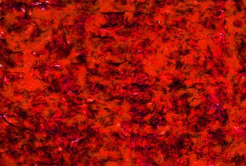 Transparent texture of red papyrus. Abstract background.