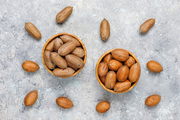 Pecan nuts on light background,top view