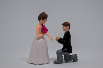 Close up model toy/miniature couple diorama. married concept isolated on White Background.