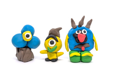 Play dough group monsters on white background. Handmade clay plasticine