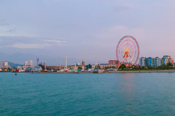 Obraz premium Batumi, Adjara, Georgia. View from the sea on resort town at evening