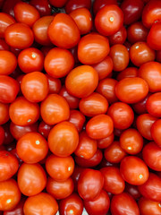 lots of red ripe tomatoes for eating like a background
