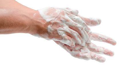 a man is washing his hands with liquid foam